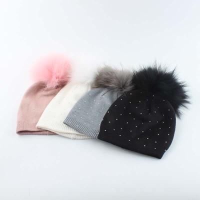 China Lovely COMMON New Style Kids Winter Hat With Real Faux Stone Raccoon Fur Pom Pom Warm Wool Knitted Beanie Kids Hat for sale