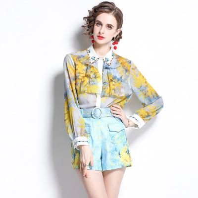 China Breathable Spring and Autumn Women 2022 Europe and America Nail Pearl Inlay Diamond Lotus Leaf Chiffon Shirt Printed Shorts Set for sale