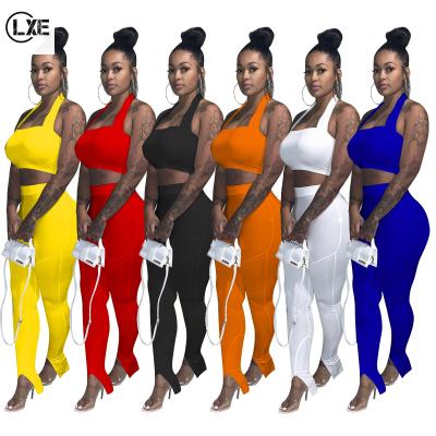 China Breathable Sheer Color LXE247 Halter Crop Top With Pencil Pants Woman Assortment Set 2021 Spring Two Piece Set for sale