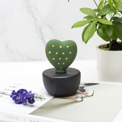 China Sustainable Aromatherapy Diffuser Ceramic Ceramic Cactus Decorative Commercial Air Freshener for sale