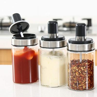 China High Borosilicate Glass Viable Spice Jar Kitchen Canister Condiment Jar, Combination Spoon and Seasoning Lid for sale