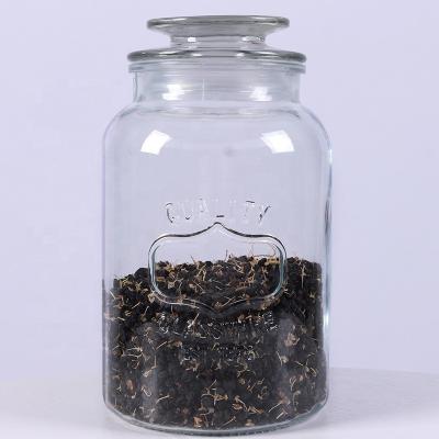 China Freshness Preservation 1500ml 52oz Embossed Glass Jar Cheap Price With Sealed Glass Cover for sale