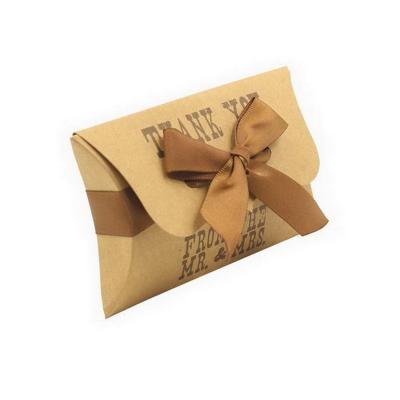 China Handmade Customized Recycled Kraft Paper Pillow Box With Ribbon Bow For Gift Packing for sale