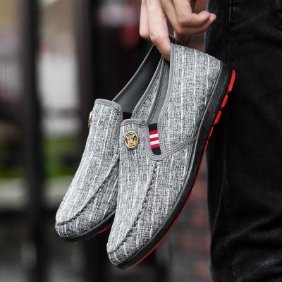 China Cheap Vintage Fashion Trend China Factory Price Black Fabric Gommino Bright Soft-Soled Fashion Casual Walking Casual Walking Slip-On Shoes For Men for sale