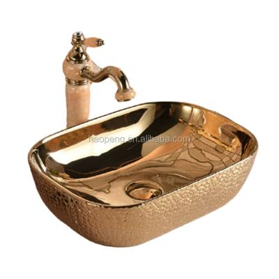 China Newest Modern Gold Wash Basin Iran Color Ceramic Basin for sale