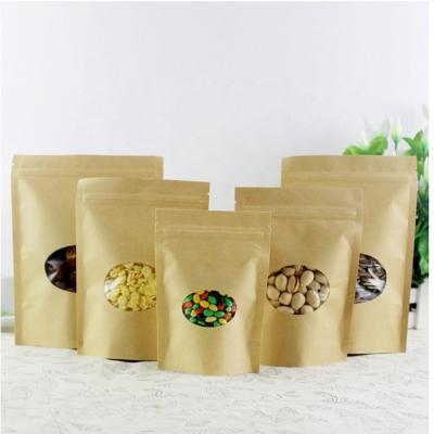 China Brown Paper Bags Recycled Craft Pouches Moisture Proof Resealable Food Packaging Paper Bags With Clear Oval Window for sale