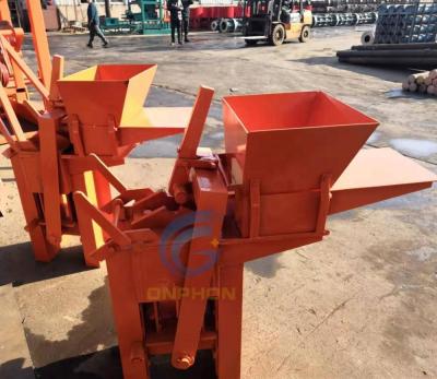 China Building Material Stores Half-Brick Block Making Hand Press Clay Brick Machine for sale