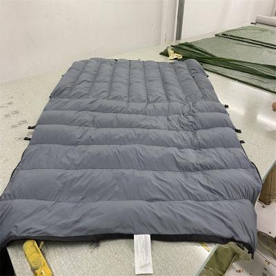 China QUE Multifunctional Multifunctional Convenience Down Sleeping Bag Blanket Goose Down Blanket Camping Blanket for sale