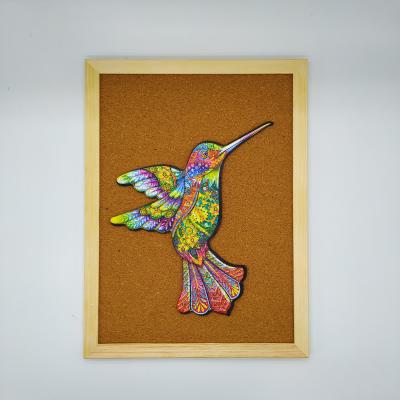 China Cartoon Toy Wooden Jigsaw Puzzles Unique Shaped Hummingbird A4 Size Best Gift For Adult And Kids for sale