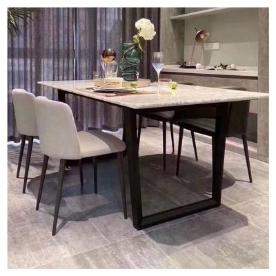 China The first floor is made of cowhide and the whole piece of metal frame leather strap metal leg velvet fabric dining chair for sale