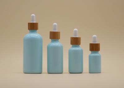 Cina Colori le bottiglie di olio essenziale degli azzurri 15ml 30ml della glassa con il contagoccia di bambù in vendita