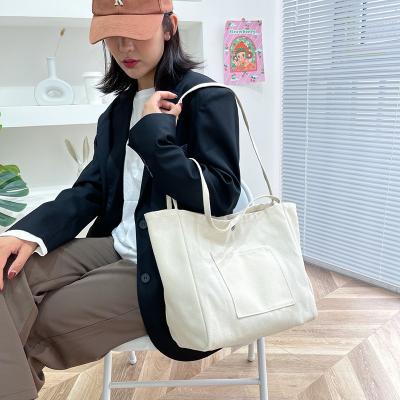 China Extra Large Canvas Travel Women Handbag Wholesale Custom Thick Duffle Cotton Foldable Shopping Premium Tote Bag for sale