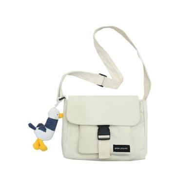 China Vintage Thickened Canvas Bag Fashion Mailman Bag Lock Handbag Shopping Bag Handle for sale