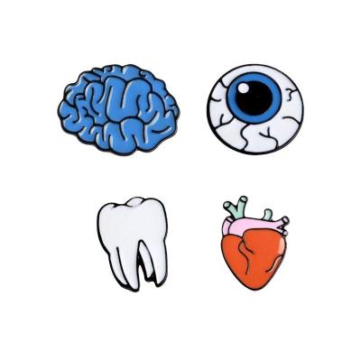 China Europe Cartoon Creative Brain Metal Badge Brooch Simple Tooth Eyes Heart Badge Doctor Nurse Enamel Pin for sale