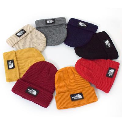 China JOINT manufacturers wholesale solid color knit hat men's luxury famous brand knitted hat women's unisex winter hats for sale