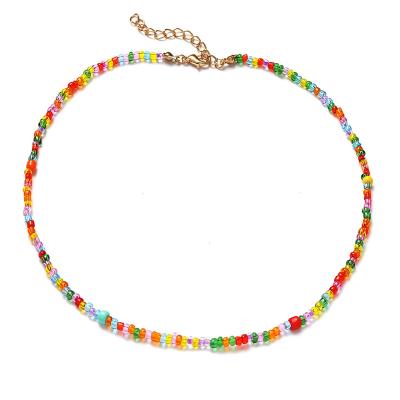 China 2022 Ethnic Multicolor Women Boho Daisy Flower Necklace Vintage High Quality Rainbow Flower Bead Girl Acrylic Sweet Tiny Choker Jewelry for sale