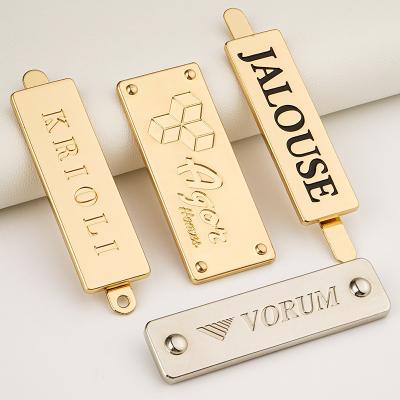 China Dongguan Kangsheng Customized Metal Plates for Handbags Fashion Style Gold Metal Logo for sale