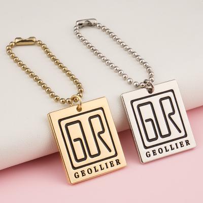 China Professional Designer Handbag Metal Tag with Fashion Engraved Logo and Hanging Chain for sale