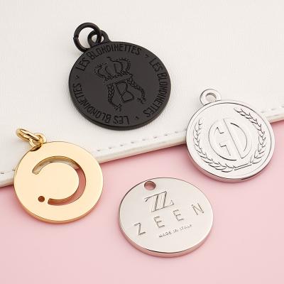 China Handbag Hanging Logo Tag Round Hang Embossed Metal Bag Logo for User-Friendly Style for sale