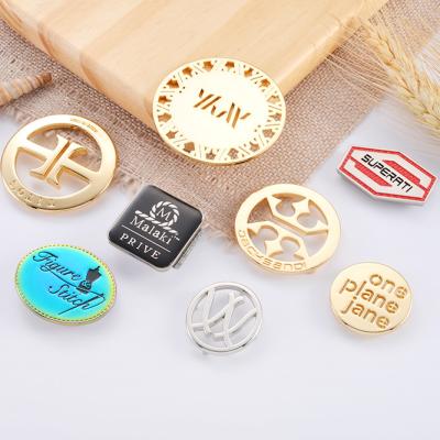 China Nickel-free Metal Round Logo Labels for Handbags Custom Metal Tags in Different Styles for sale