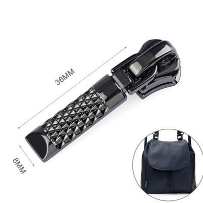 China Custom Gunmetal Zip Puller for High Level Handbag Accessories Professional Zipper Pulls for sale