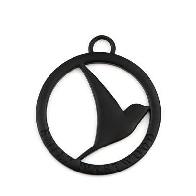 China Metal Round Shape Hollow Bird Logo Hang Tag for Custom Handbag Branding in Black for sale