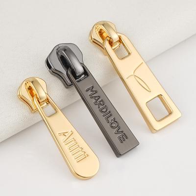 Китай 7 Days Sample Order Lead Time Luxury Gunmetal Zipper Pulls with Custom Logo продается