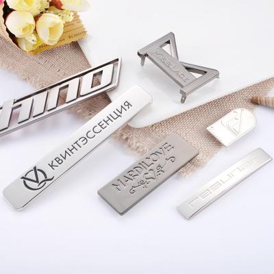 China Custom Metal Label Plates For Bags Adhesive Metal Name Tags Metal Logo Bag Accessories for sale