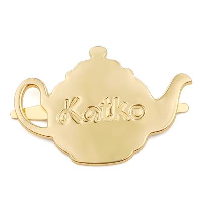 China Custom Logo Tag in Teapot Shape Gold Plated Metal for Bag Hardware Customization for sale