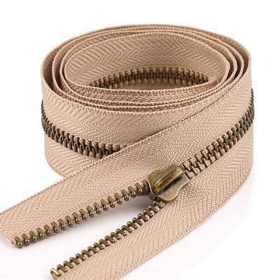 China Widely Used 5 Long Zipper Antique Brass Y Teeth 5 Metal Zipper Rolls for Handbag Clothes for sale