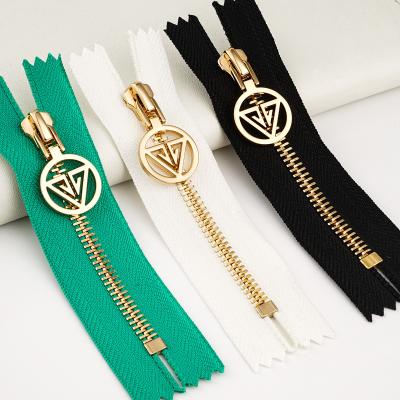 China Widely Used Metal Zipper for Purses Garment Custom Logo Pull High End Gold Zipper for sale