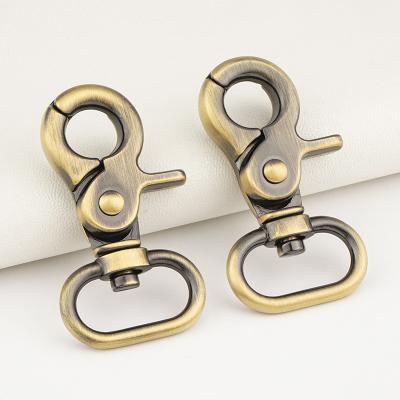 China Brushed Brass Snap Clip Hook Buckle 20mm Swivel Trigger Snap Hook for Bag Accessories for sale