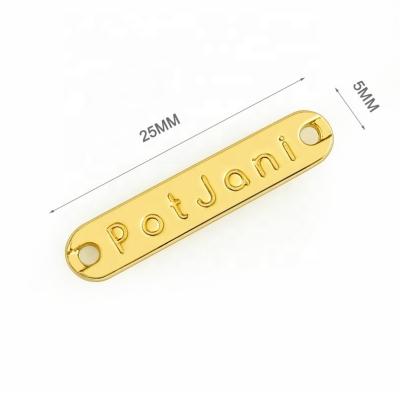 China Sustainable Customized Size Gold Plated Rectangle Metal Label for Swimwear and Bikini for sale