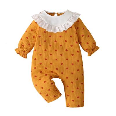 China Casual/Cute/Soft/Vintage/New Design Babies Muslin Soft Organic Cotton Long Sleeve With Ruffle Pleated Collar Romper Red Heart Printed Baby Jumpsuit for sale