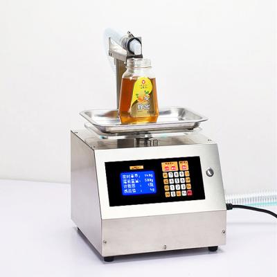 China Small CNC Food Economic Friendly Mini Liquid Pump Filler Bottle Filling Machine for sale