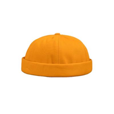 China Vintage Mens Womens Cotton Skull Urban Unique Brimless Cloth Portable Docker Hats Hats for sale