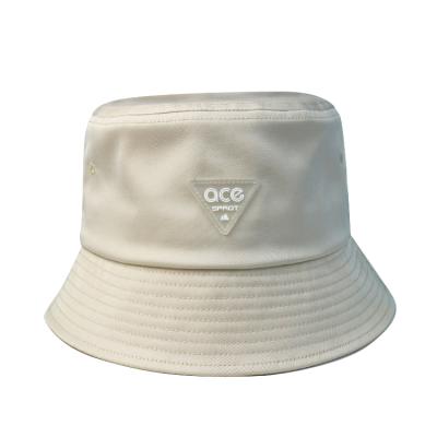 China 2021 Wholesale New Design ACE Plush Beige Bucket Hat Basin Hat With Rubber Patch Logo for sale