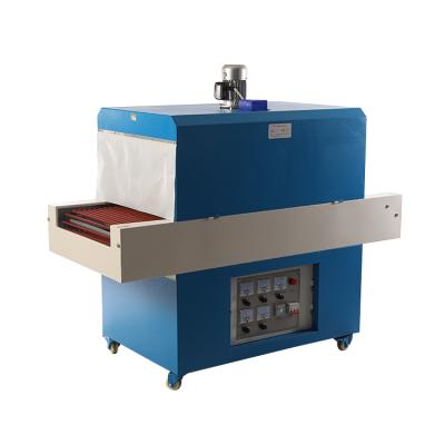 China Semi Automatic Food Heat Tunnel Shrink Wrapping Wrapping Machine for sale