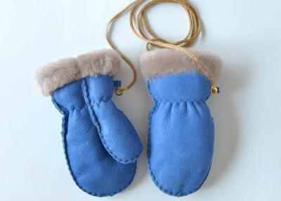 China Warme gemütliche echte Baby-/Mädchen-Schaffell-Handschuhe mit Band für Winter zu verkaufen