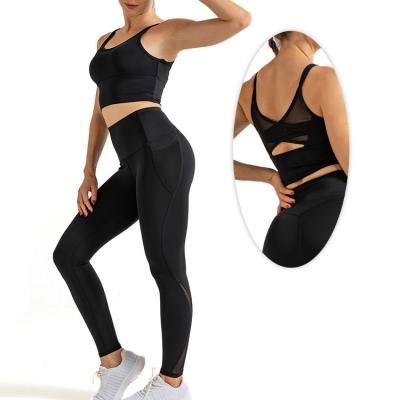 China Breathable Plus Size Mesh Stitching Cross Beautiful Back And High Waist Hip Gaiters Yoga Workout Suit for sale