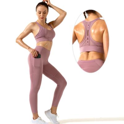 China Mesh Stitching Breathable High-Elastic Yoga Clothing Suit Gathers Sports Bra Pocket Yoga Pants Sports Suit for sale