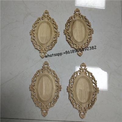 China Traditional Oval Wooden Carved Applique Furniture Room Onlays Decorative Wood Appliques for sale