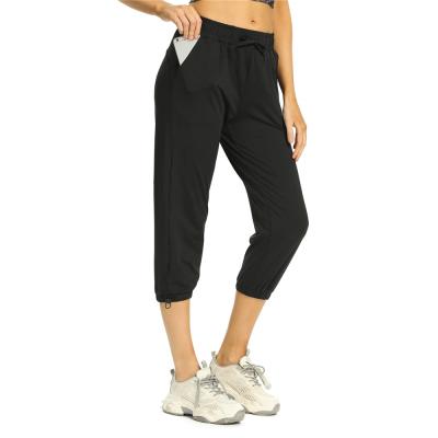 China Sweat-Wicking Sweat-Wicking Women's Capri Workout Loose Sweatpants Lounge Pants Comfortable Drawstring Joggers With Pockets Tapered Rope Lock Pants for sale