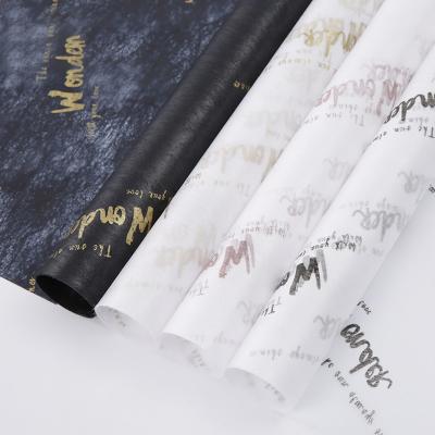 China Wholesale Waterproof Non Woven Fabric Printed Gift Flowers Wrapping Color Tissue Paper For Christmas for sale