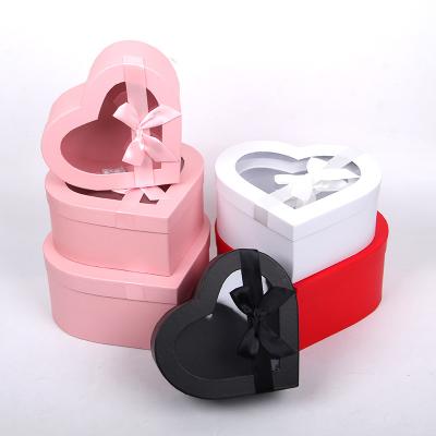 China Recyclable Custom Logo Heart Shaped Clear Rose Flower Boxes Paper Gift Box With Clear Ribbon PVC Window for sale