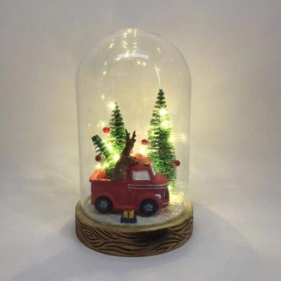 China Popular Christmas Gift 14.5*24.5cm Christmas Tree In Glass Dome With Led String Light Battery Operated Christmas Festival for sale