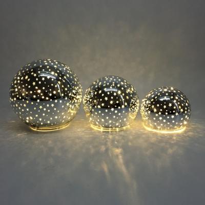 China Christmas Ornaments Electroplative Pentagon Adorn Glass Balloon With Led Light for sale