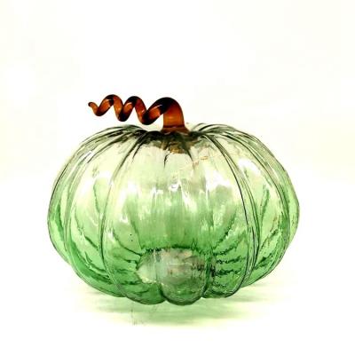 China Simple Warm Carfts Harvest Festival Party Decoration Clear Green Glass Pumpkin Light Timing for sale