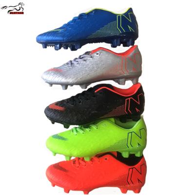 China New Rubber Mustang Design Lower Price Stock Shoes Fujian Indoor Soccer Shoes for sale