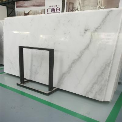 China Modern Customized Marmol Italian Natural Pisos Stone Guangxi Carrara White Marble Slabs With Good Flooring Price for sale